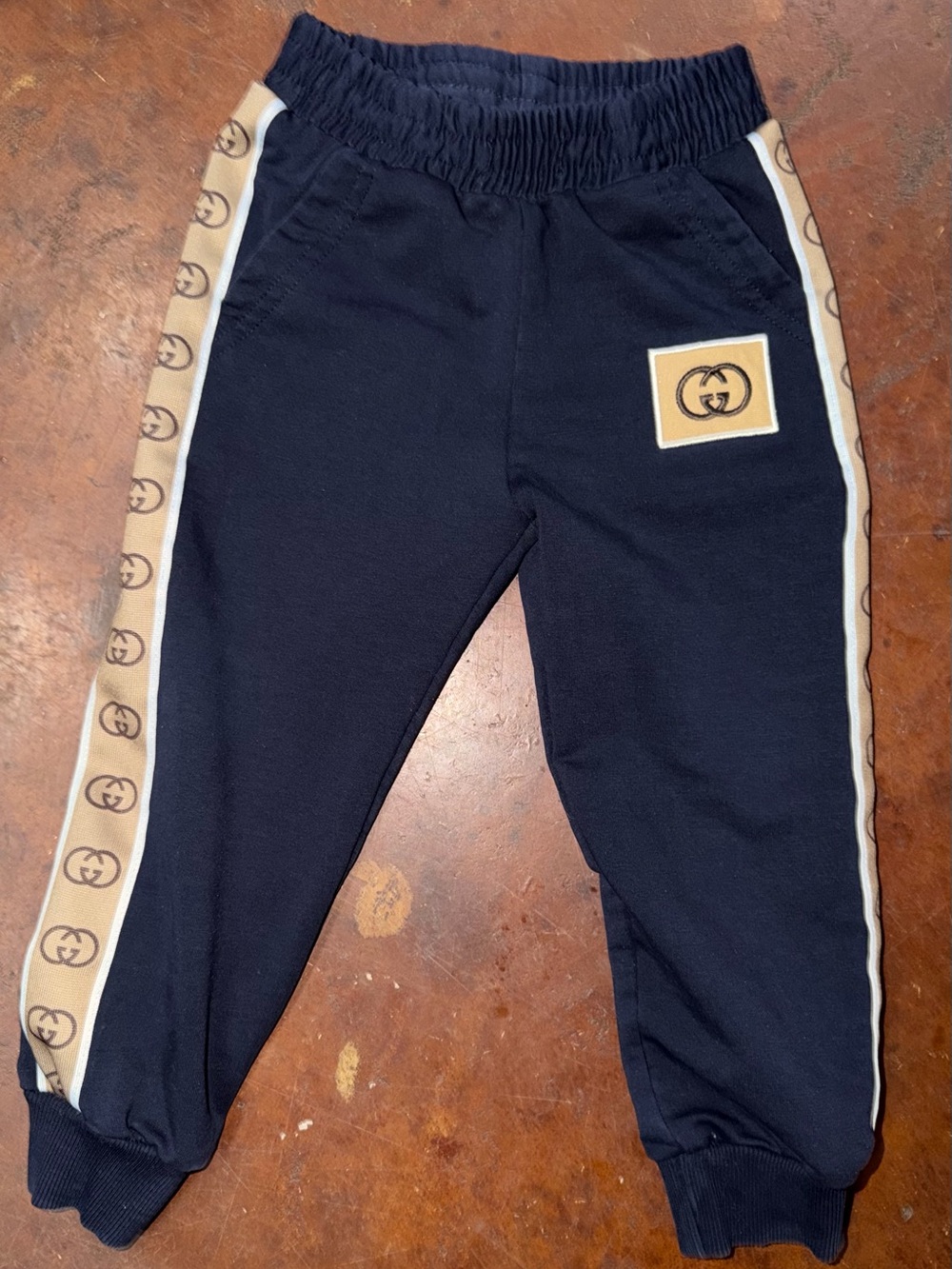 Gucci Navy Joggers with Tan Logo Tape